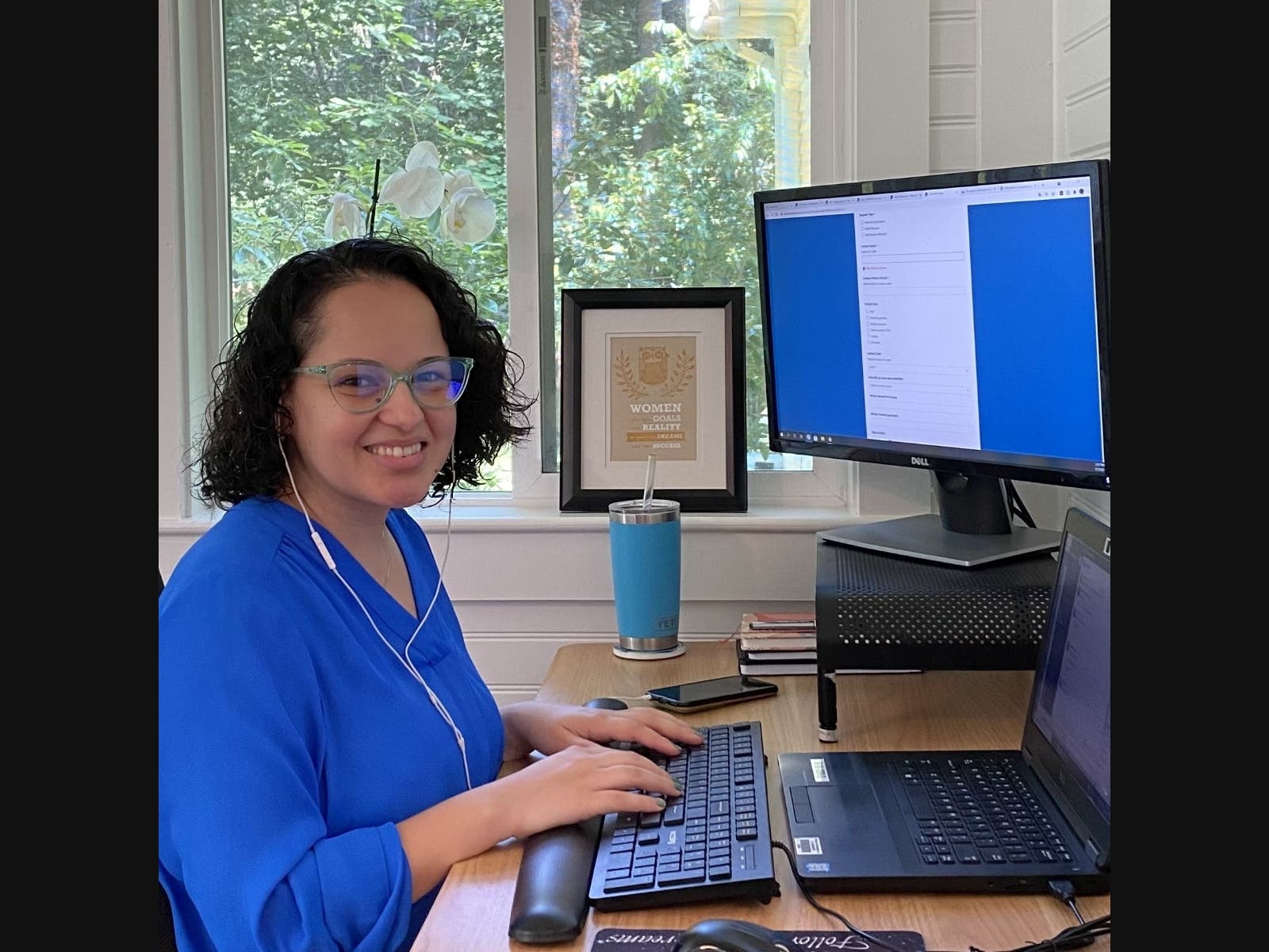 Genilce Santana, a local resident and one of MetroWest Care Connection’s care navigators, provides support to callers in English, Portuguese, and Spanish.
