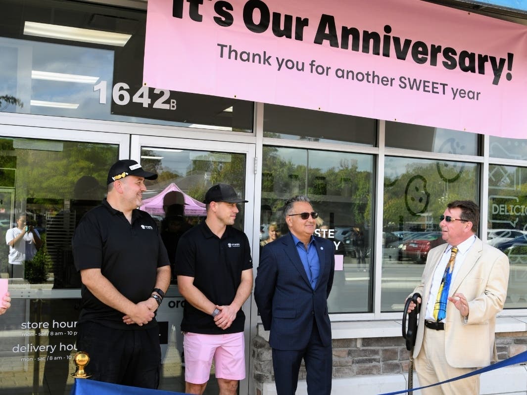 Crumbl celebrated its second annivarsary. From left to right - Bob Snedeker, Tucker Bartone, Mayor Anthony Giannattasio, Simon McDonald.