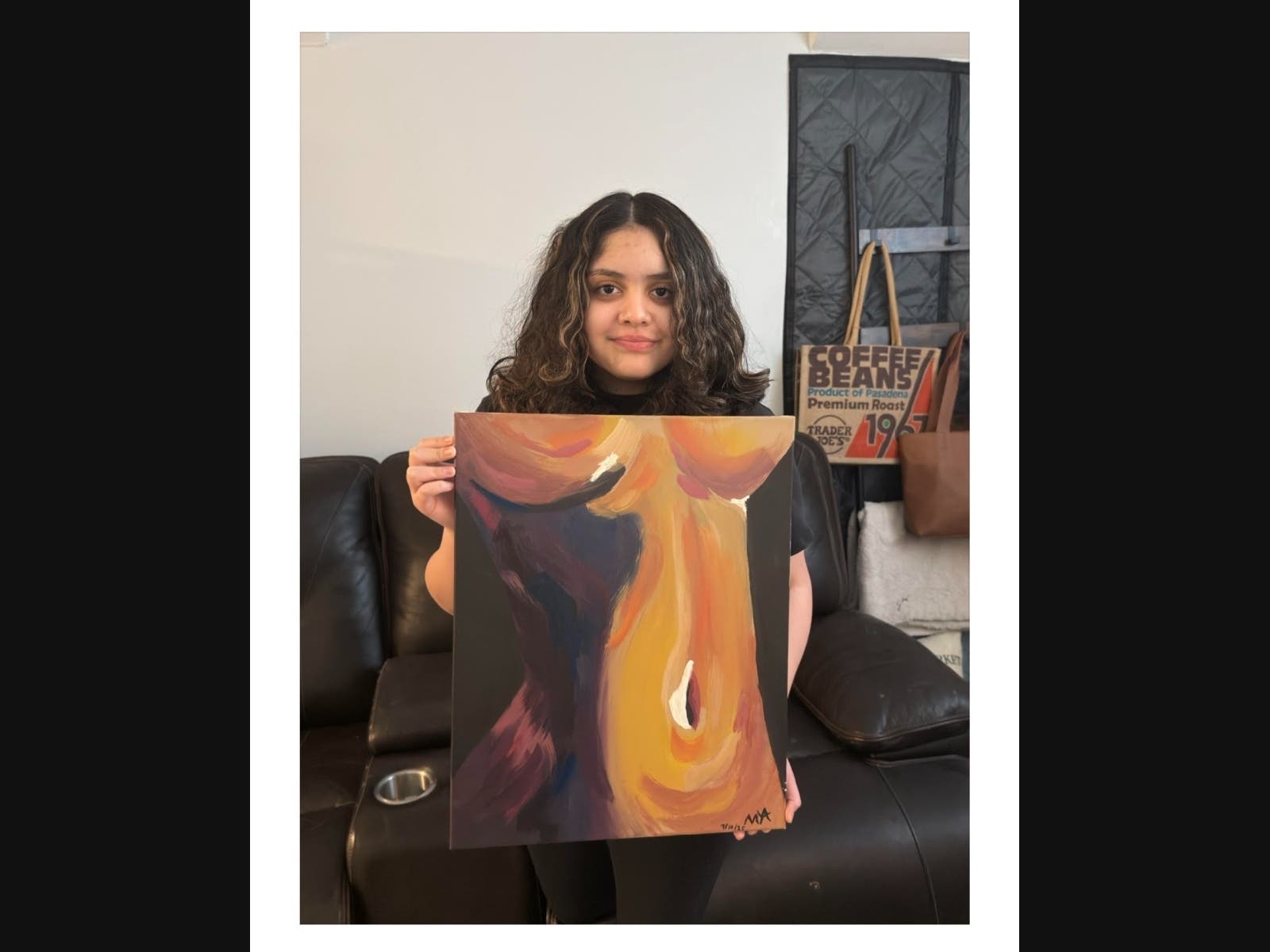 Mila Natalia Aziz with her acrylic painting titled Her Anatomy. This piece is especially meaningful to Mila, as it represents an important early milestone in her artistic journey and growth as a painter.
