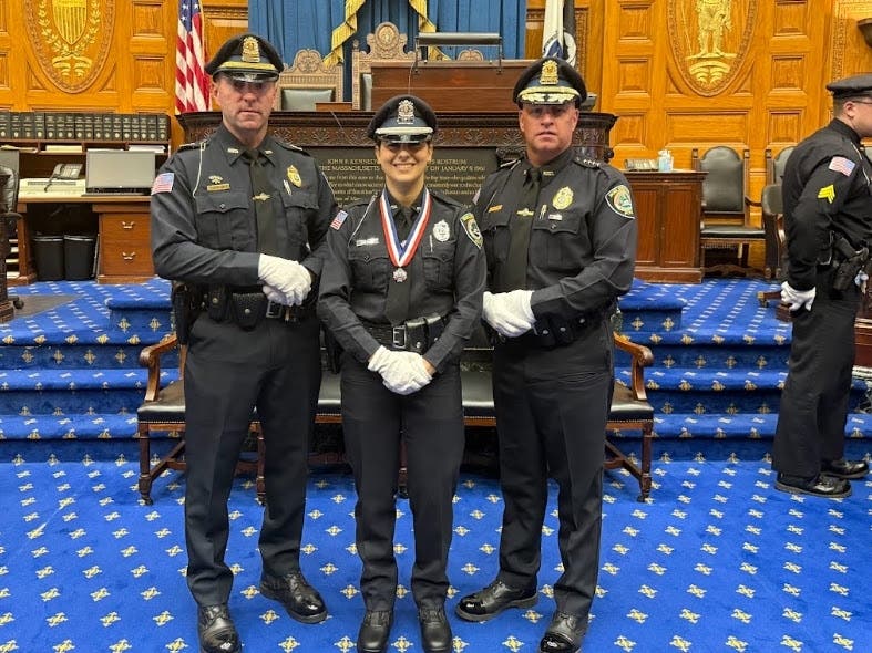 Officer Miedico with Deputy Chief Daniel Hanafin (left) and Chief Thomas Browne (right).