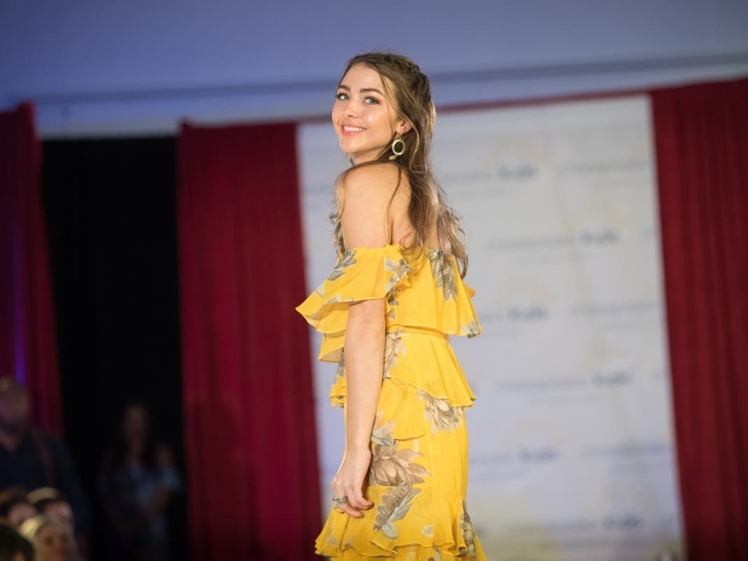 A model takes the runway at the 2019 Fashion for a Cause