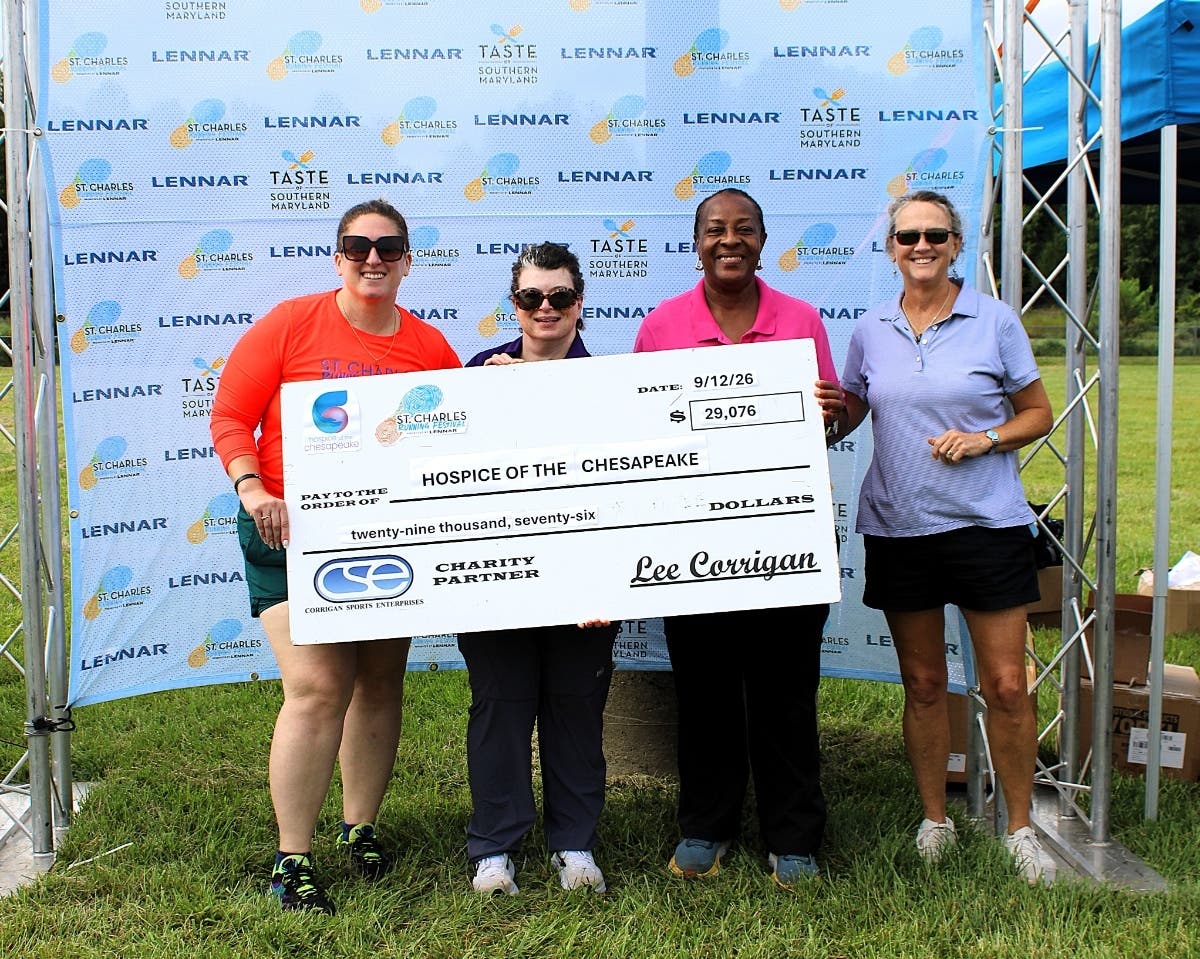 Pictured from left are Kerri Stancil, Heather Marchese, Carolyn Herring, presenting the check on behalf of Lennar and Corrigan Sports Enterprises, and Lisa Railey.