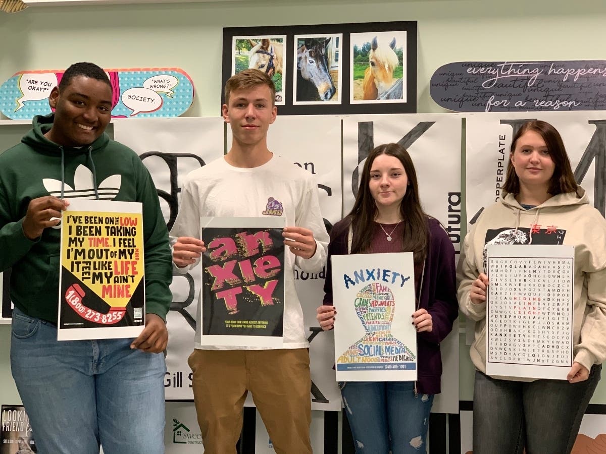 Pictured from left to right are Graphic Design students Domontaa Thomas, Garrett Loescher, Saige Brelsford, and Myia Smith. Their posters were selected as winners in Cabrini University’s Art + Effect High School Poster Contest.