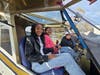 Shyla Scott and Di’Nah Huddleston, juniors at Hazelwood East High School, were able to sit in the cockpit and “take the controls” of an aircraft used by SLU's certified flight instructors for pilot training during the Girls in Aviation event.