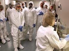 URI Pharmaceutical Development Institute Coordinator of Training Beth Zielinsky-Habershaw conducts a training course with Amgen employees in the URI College of Pharmacy's institute.