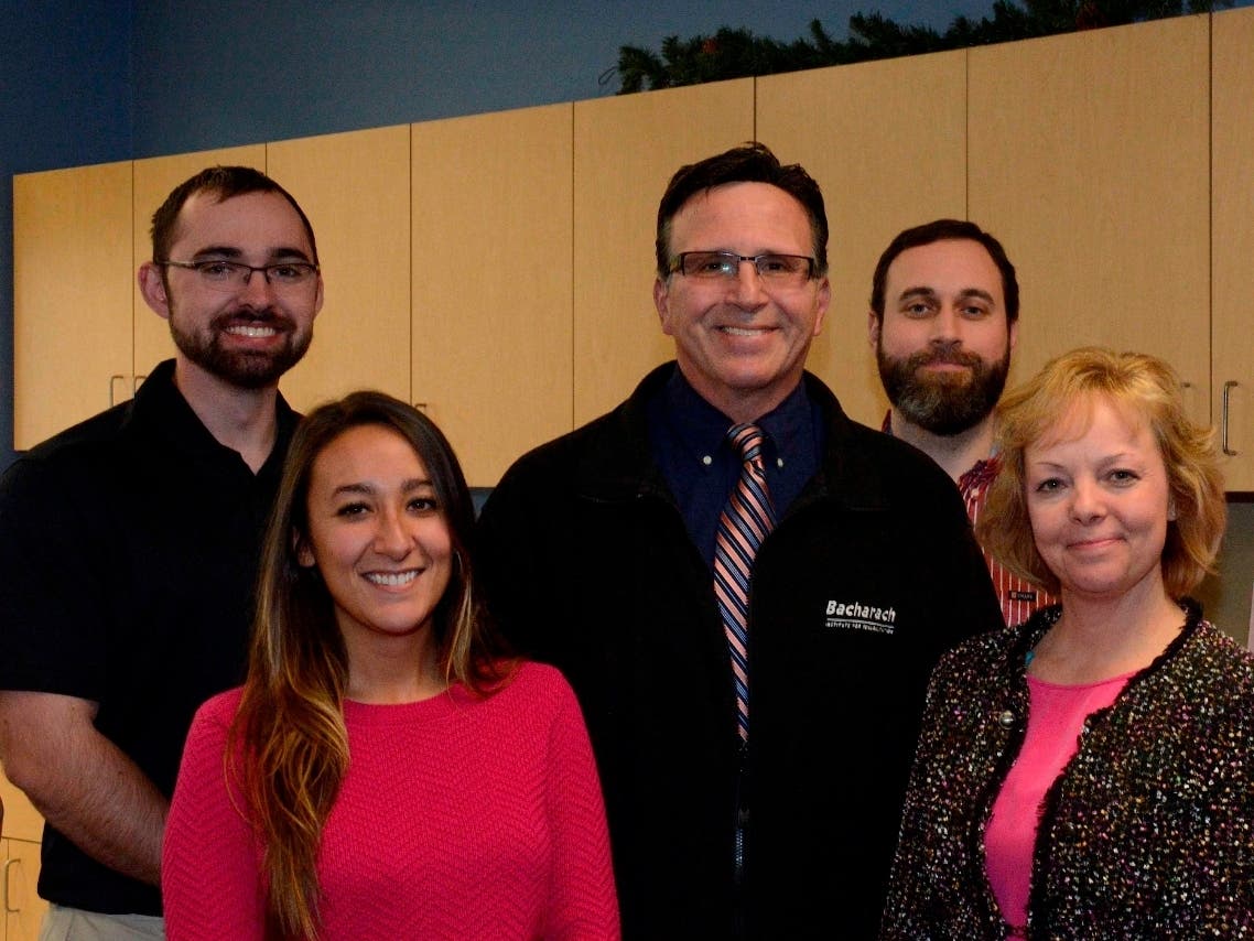 Ronn Franceschini, M.Ed. (center) and his Cardiac Rehab Team.