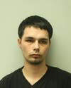 Brandon M. Fernandez, 25, was arrested outside the Circle K gas station in Tewksbury on Monday.