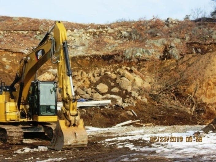 Neighbors say houses as far away as 500 feet from the site will shake during blasting at the north Woburn site.