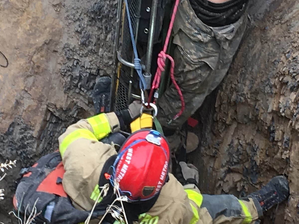 Emergency crew members help pull a teenager out of an abandoned mine shaft in Golden. Via West Metro Fire Rescue Twitter