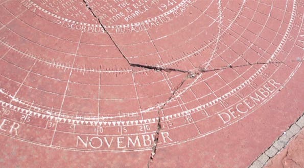 Damaged flagstone at the Cranmer Park sundial in Denver. Via Save Our Sundial