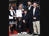 State Rep. Kathleen Kennedy (left) and Orange Chamber of Commerce Executive Director Barry Lee Cohen (right) present House of Brides owner Edina Jusic with an official citation on behalf of the Connecticut State General Assembly.