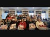 Valentine's Day themed care packages for women serving overseas in the U.S. Armed Forces are assembled at Polly Cooper Chapter's Project Patriot Party