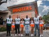 Hooters has finalized deals with Bulls offensive linemen Demetris Harris, Mike Lofton, Brad Cecil and Cole Best. The lineman visited their neighborhood North Tampa Hooters location on Aug. 30 and took photos with several Hooters Girls.