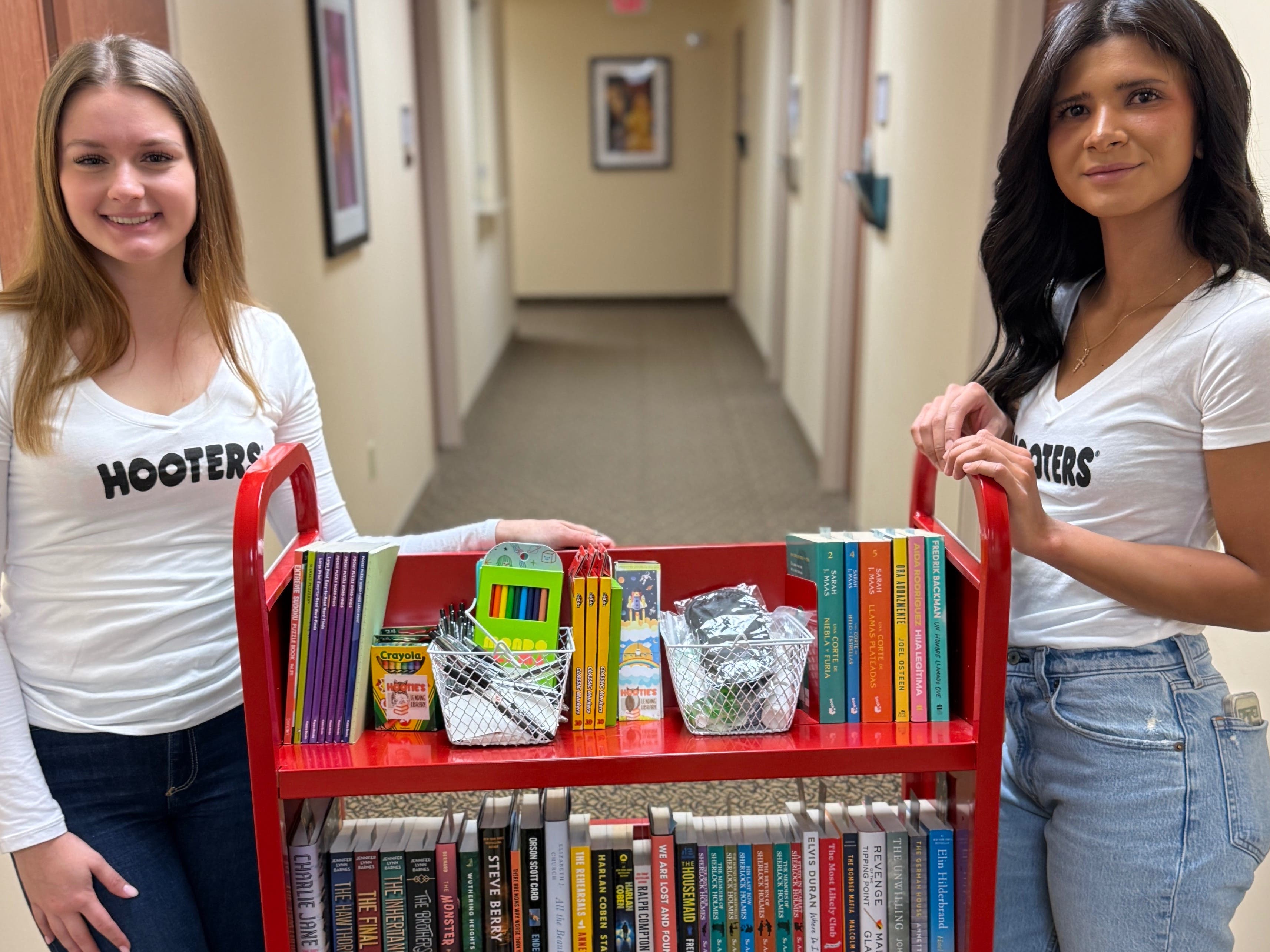 SWFL Hooters Employees Deliver More Books and Activities in April to Support Cancer Patients