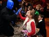 Blue Man Group poses for photos and hangs out with children during the Teddy Bear Tea event at the Four Seasons.