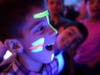 A boy gets his face painted before one of the shows during school vacation week.