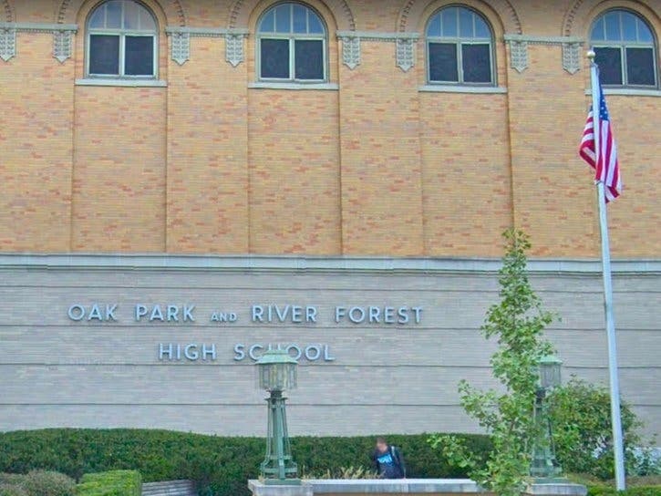 OPRF High School will reprint its yearbooks after a racist hand gesture was discovered in photos.