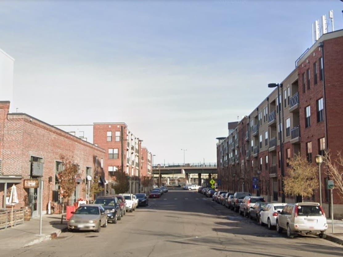 A man was taken into custody Wednesday after two people were shot, one fatally, in the 2900 block of Huron Street, police said.