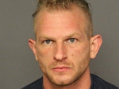 Michael Close, 36, is accused of shooting 21-year-old Isabella Thallas to death over a dispute about a dog pooping, officials said.
