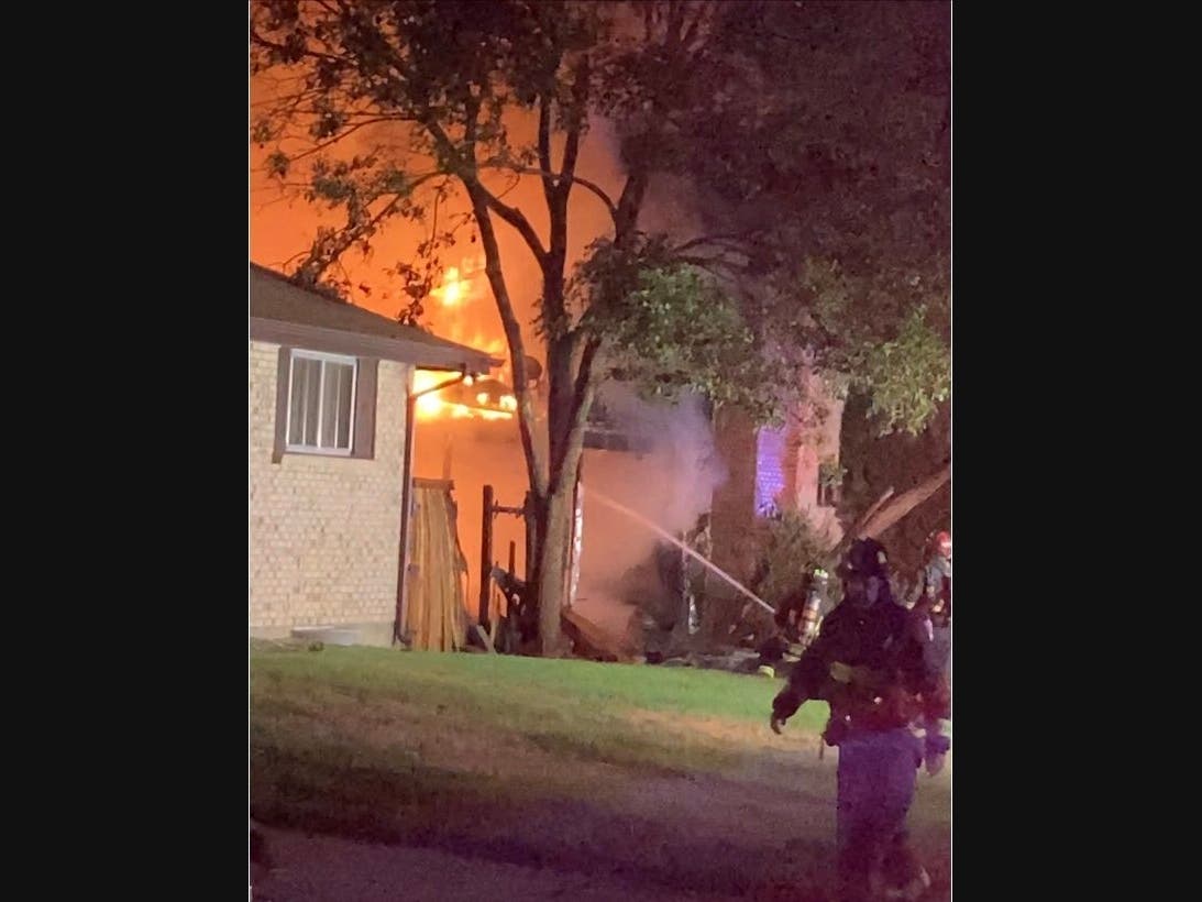 Arvada fire crews battled a house fire early Wednesday morning.