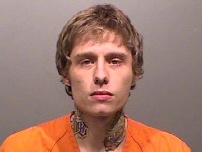 Austin Michael Heuberger, 26, is accused of sexually assaulting two clients while he worked a tattoo parlors in Arvada, officials said.