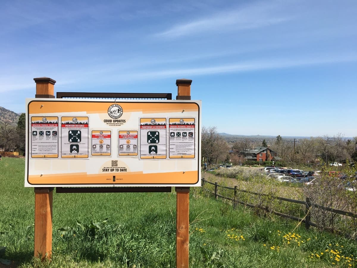 Signs are up across Boulder County reminding visitors and residents to follow public safety guidelines amid the COVID-19 outbreak.