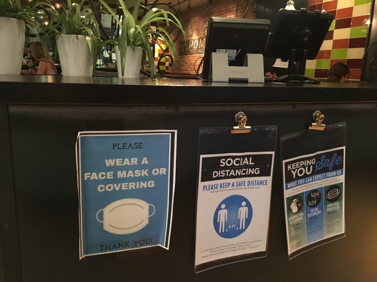 Coronavirus warning signs are up in every Denver restaurant as cases continue to climb in the city. Denver is among 15 counties that will move to stricter restrictions Friday.