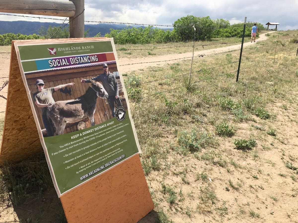 Signs are up across Colorado reminding visitors and residents to follow public health guidelines amid the pandemic.