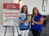 Collecting the President’s Award for Membership were CWC-FPRA president Rhonda Leiberick (left) and VP of membership Melanie Reda 