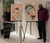 Streets of Paradise's Cathy Bryant and Greg Cruz with art from Lipstick Lex
