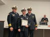 OFPD Fire Chief Michael Schofield, award recipient Lt. Daniel Ritchie, and presenter Illinois Task Force 1 Team Leader and OFPD Battalion Chief John Purtill