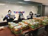 Northwestern Medicine Lake Forest Hospital staff setting up to provide meals donated by local businesses and community members.