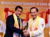 Health Minister Lackram Bodoe and Dr. Hong warmly interact during the bell-ringing ceremony.