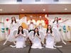 Dr. Hong, Tao-Tze, Prime Minister Briceño, and FOWPAL members dressed as angels pose for a group photo.