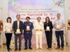 Dr. Hong Tao‑Tze (third from right),  Zhang-men-ren of Tai Ji Men, presents distinguished guests with “Tai Ji Yuan” necklaces and perpetual calendars, symbolizing deep friendship and long‑term collaboration.