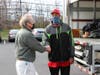 Brian Reed, a teacher at Y.A.L.E. School and organizer of the “One-for-One” Project, thanks Desmond Newbill, Camden County Toys for Tots Coordinator with the Marine Corps Reserve for coming to collect the donated hand-crafted wooden racecars.