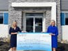 Samaritan’s 2022 Gala Chair Jamie Bratton of Innovative Benefit Planning (left) and Samaritan President/CEO Mary Ann Boccolini (right) stand with a $151,000 donation from the organization’s 2022 Celebration of Life: Above and Beyond Gala.