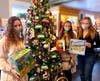 Santa's helpers from Newbury Place. L to R Maia Cyganowski, Ali DiPaolo, and Grace Steenburgh