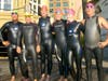 Kitty Tetreault (2nd from right) with Olympic swimmer Janel Jorgensen McArdle and other swimmers at a previous Swim Across America Boston open water swim.