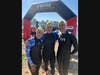 Julie and Rob Colligan of Old Greenwich, are 20 year swimmers and volunteers with Swim Across America - Fairfield County and will be hitting the water again on Sat., June 20, to help make waves to fight cancer. Pictured with them is Chris Calkosz.