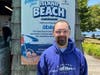 Danny, an Abilis community member and employee of the Island Beach Concession Stand, models one of the new Island Beach hoodies available this summer at the Island Beach Concession Stand and online through Abilis' website (abilis.us)