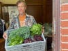 Advocate Good Shepherd Smart Farm Manager Chris Cubberly delivers freshly-harvested lettuce and kale to South Side patients. 