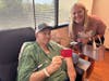 Breast cancer Debbie Beagle offered coffee gift cards and words of encouragement to patients at the Advocate Condell Infusion Center. 