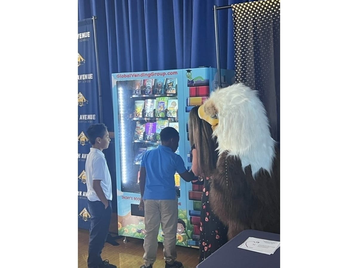 Skylar the Eagle, the Park Avenue Elementary School mascot, joined in at the unveiling of the lnchy the Bookworm vending machine in Freehold Borough.