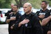 Clearwater Police officers pay tribute to their fallen K9 companions. 