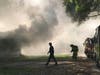 Due to a lack of fire hydrants, firefighters had to bring in tanker trucks to fight the flames.