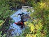 Sheriff's divers work to recover the body of Gustavo Bonifacio De La Cruz.