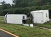An overturned food trailer spilled propane onto State Road 60. 