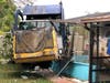 An out-of-control garbage truck plowed through their yard on Tinsmith Drive.