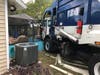 An out-of-control garbage truck plowed through their yard on Tinsmith Drive.